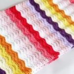 Splendida coperta arcobaleno con un motivo insolito