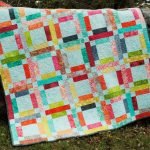 Coperta sottile fatta di quadrati e rettangoli con le tue mani