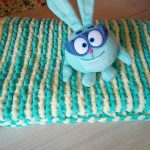 Coperta di peluche beige e turchese