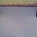 Grande coperta con coniglietti lungo il contorno