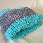 Coperta di peluche per neonati lavorata a mano