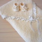 Set di coperta e stivaletti per la dimissione
