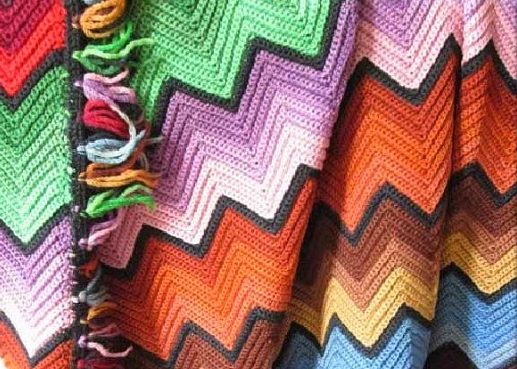 Coperta con nappe