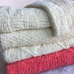 Coperte per neonati di diversi colori e consistenze
