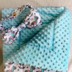 Coperta di peluche turchese con cavalli