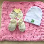 Coperta di peluche rosa con motivo a scacchiera
