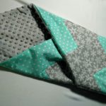 Coperta patchwork grigia e turchese
