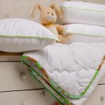 Piumino trapuntato e cuscini per un bambino in crescita
