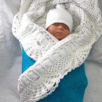 Busta traforata in maglia per neonato