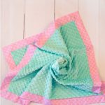 Coperta di peluche verde e rosa Minky