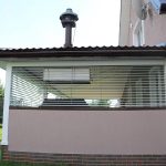 Deflettore sul tubo di scarico della cucina estiva