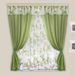 Tende corte bicolore con combinazione verde e floreale