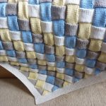 Tappeto-plaid lavorato a maglia