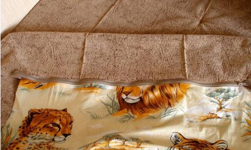Cucire la cerniera, inserire l'imbottitura