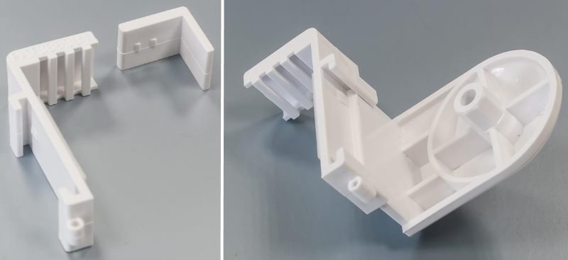 Staffe in plastica per il fissaggio delle tende a rullo su un'anta mobile
