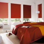 Tonalità bordeaux nell'arredamento della camera da letto