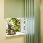 Combinazione di tende verticali con tende a rullo