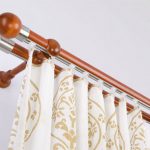 Bastone per tende in legno per parete