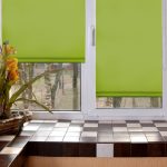 Tende a rullo in tessuto sintetico di colore verde chiaro