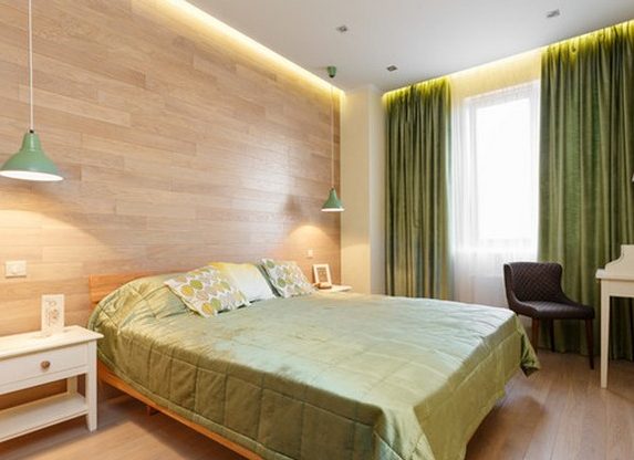 Accogliente camera da letto con tessuti color oliva