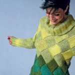 Ragazza con un maglione alla moda
