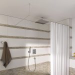 Cornice a L realizzata con un tubo fissato al soffitto