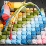 Coperta-tappeto a forma di bomboniera multicolore