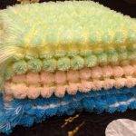 Coperte con pompon multicolor fai da te