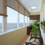 Tende a rullo in legno all'interno di una loggia arredata
