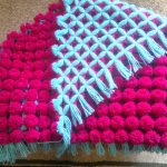 La combinazione di rosa e blu è insolita per una copertina per neonati.