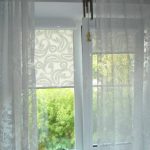 Combinazione di tende a rullo e tulle
