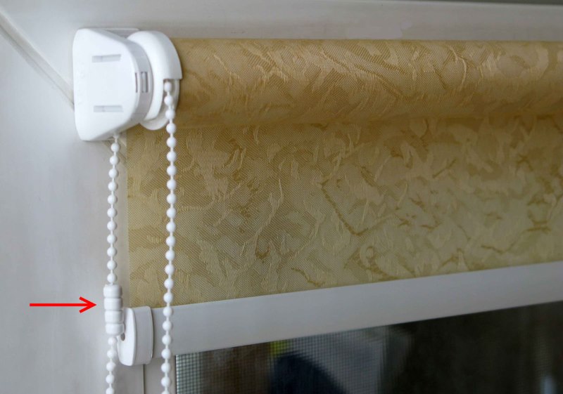 Fermo sulla catena di una tenda avvolgibile di tipo aperto