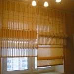 Decorare una finestra di plastica con doppie tende