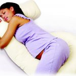 Cuscino a forma di G con imbottitura in soffice pelo sintetico