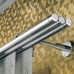 Cornice a parete con tre aste tonde