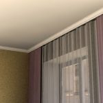 Modanature bianche sul soffitto del soggiorno
