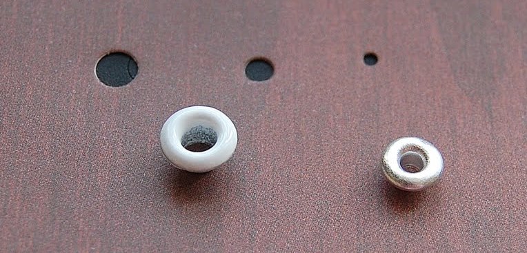 Fori per occhielli in cartone spesso