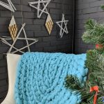 Coperta in lana merino lavorata a maglia larga turchese