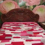 Copriletto maglione rosa