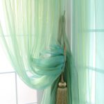 Fermatende in tulle color menta
