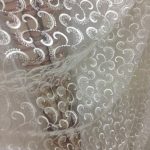 Materiale trasparente a base di microrete per tende in corridoio