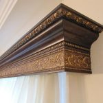 Cornice in legno a baguette per montaggio a parete