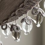 Frangia alla moda con perline di vetro