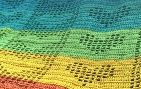 Coperta arcobaleno traforata