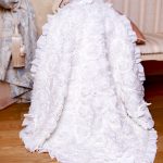 Splendida coperta bianca con rose