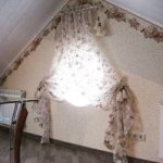 Tende provenzali per una finestra rotonda