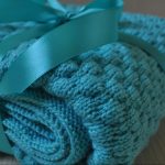 Coperta calda lavorata a maglia per le dimissioni di un bambino