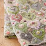 Coperta lavorata a maglia con cuori - calda e bella