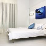 Tessuti bianchi nell'arredamento della camera da letto