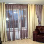 Tulle trasparente con strisce marroni